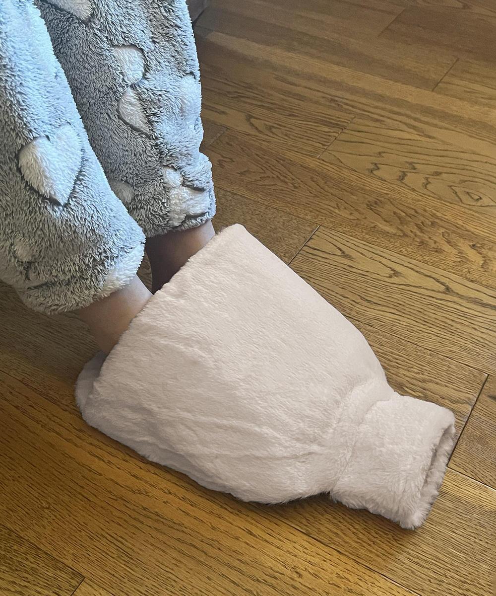 Luxury foot hot water bottle and cover in plush faux fur